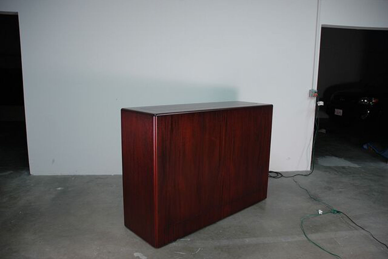 La Costa with retractable TV lift kit inside is made out of mahogany wood