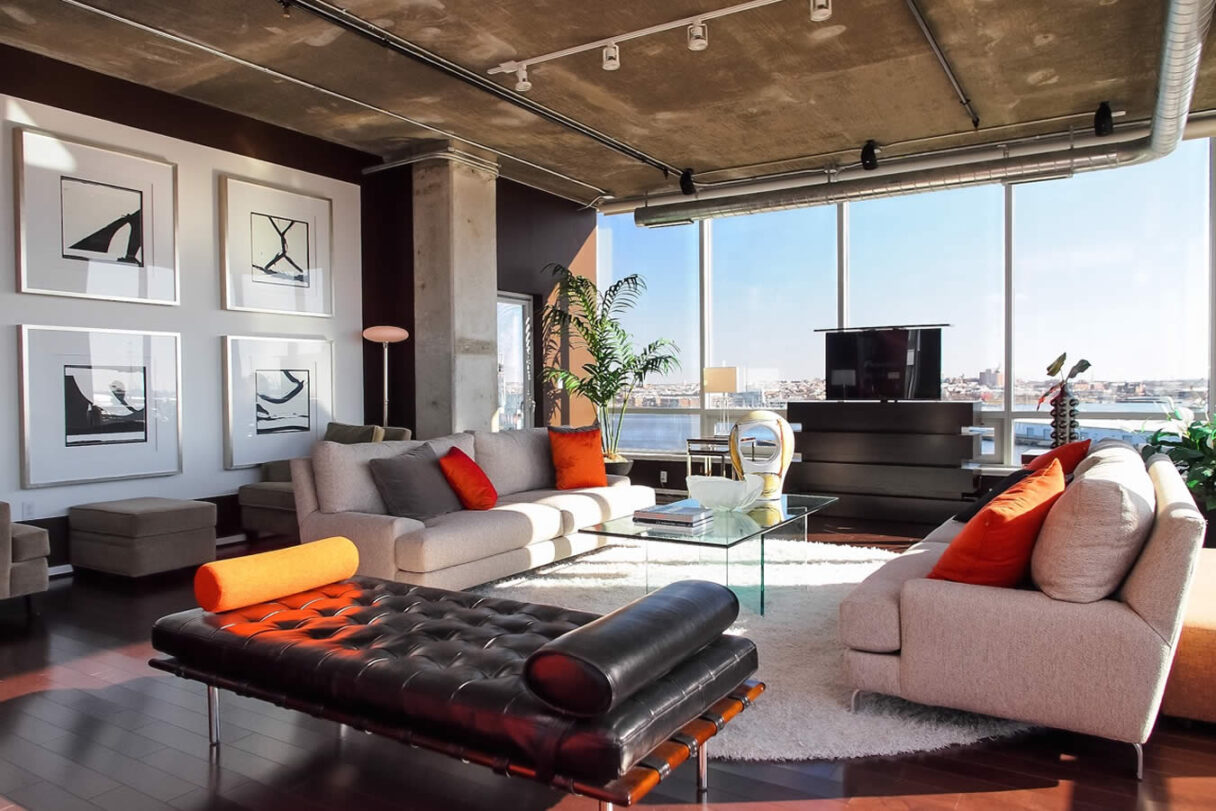 Le Bloc hidden TV lift furniture in high rise next to window by Cabinet-Tronix