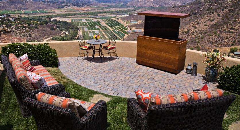 Cabinet Tronix outside motorized TV lift IPE furniture hides and protects TV in in southern California backyard