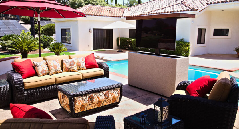 TV lift stucco outdoor cabinet has 360 swivel turns to view from pool, fireplace, deck, patiio & sitting area