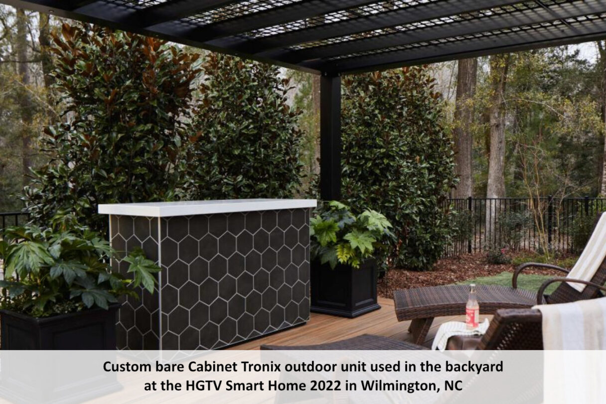 custom cabinet tronix outdoor tv lift cabinet used in the backyard at the hgtv smart home 2022 in wilmington, nc