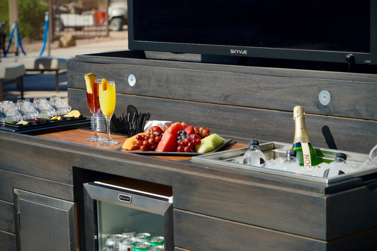 outdoor stunner tv lift cabinet and full service bar
