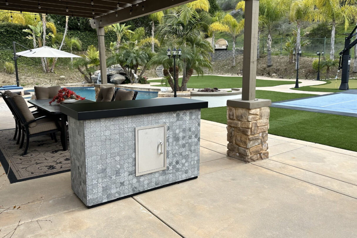 backside of marbles stone island hides tv outdoors