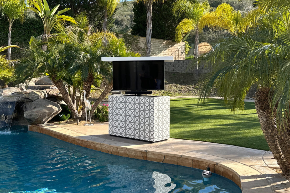 new amazing stone waterproof island that protects and hides tv outdoors
