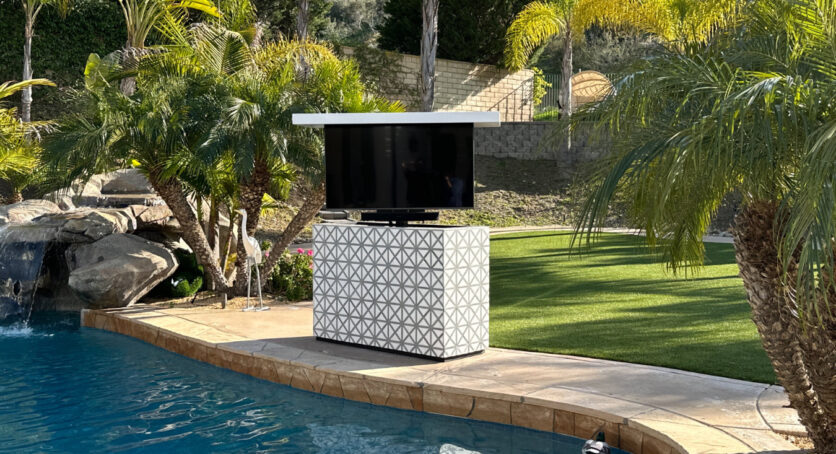 new amazing stone waterproof island that protects and hides tv outdoors