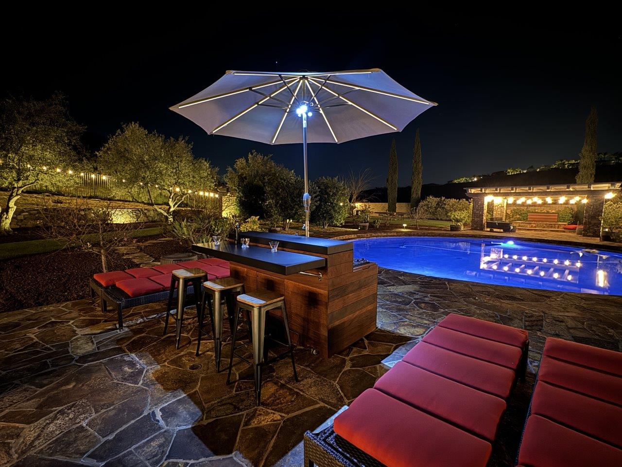 outdoor bar and hiddent tv lift cabinet mobile entertainment center with seating lighting umbrella