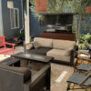 outdoor tv lift cabinet hides tv behind couch
